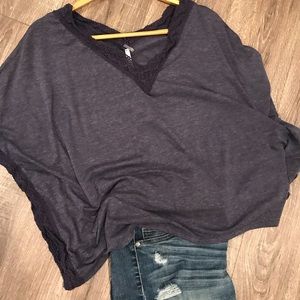 Top/bat wing style arms .one size.